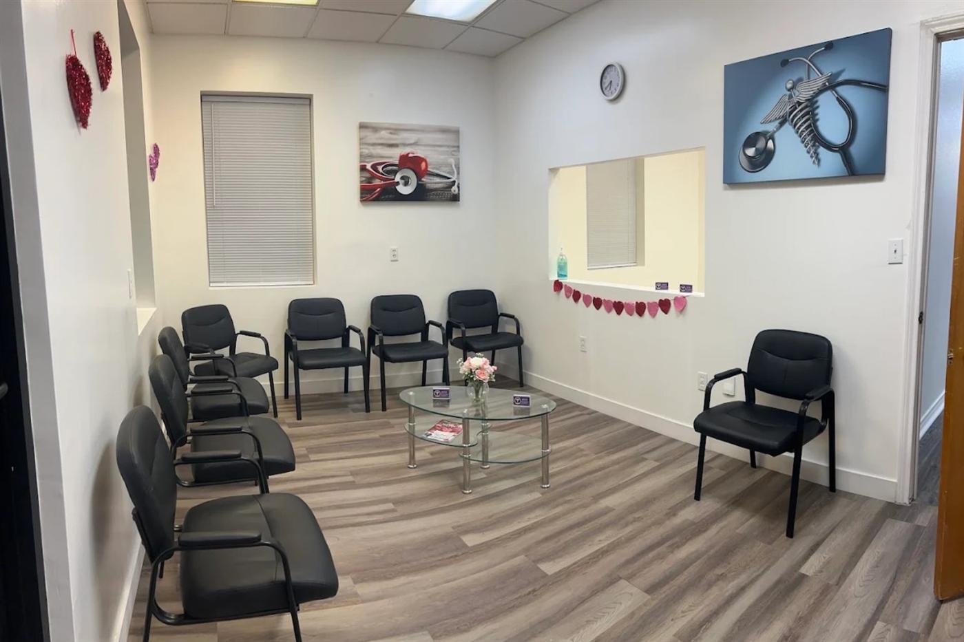 The clinic's waiting room with comfortable chairs and natural light